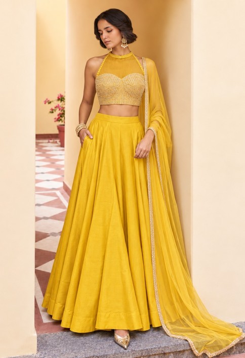 Epitome Embroidered Yellow Lehenga Choli